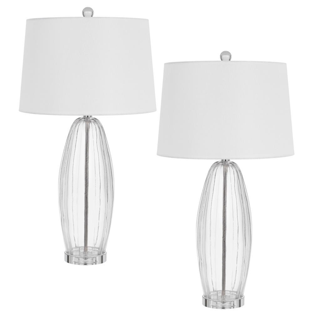 Illuminate Your Space with This Bullet Shaped Table Lamp. It Features A Clear Fluted Glass Body Set